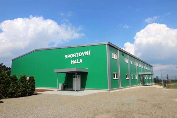 Construction of a gymnasium, multipurpose sports hall with facilities, of primary school in Senice na Hané realized in a truss steel construction with facilities, including roof and wall cladding.